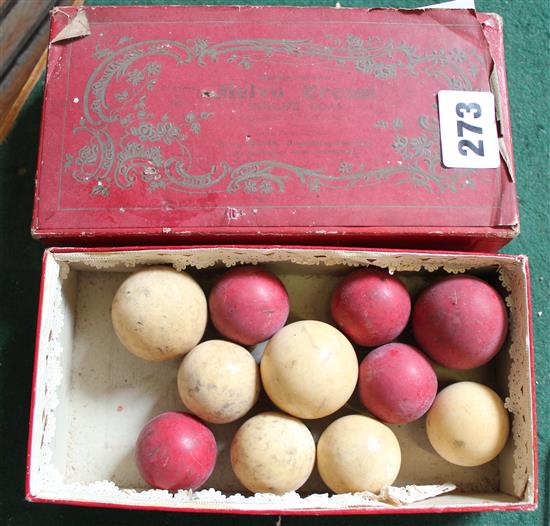 Box of miniature ivory billiards balls